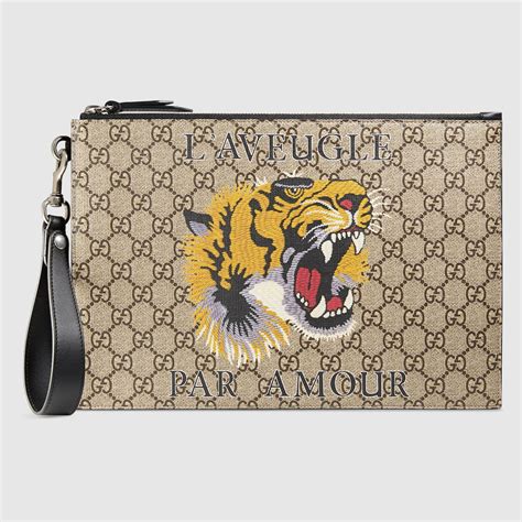 pochette gucci tigre uomo|Take Your First Look At The Gucci Tiger Collection .